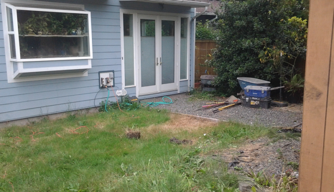 Back yard before patio and garden boxes