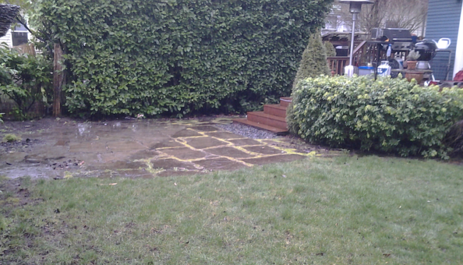 Stone patio and deck before