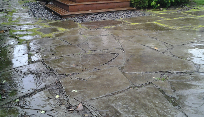 Stone patio before rehabilitating